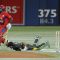 International XI batsman Devon Smith scrambles back as Asia/Canada wicket keeper lays on the ground after diving for a ball. Bagai was eventually able to stump Smith but not for the West Indies player hit for a match-high 69 runs to be named Man of the Match (Karan Vyas)